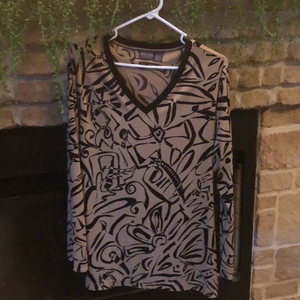 Black and beige blouse.